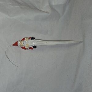 Santa atop an icicle ornament